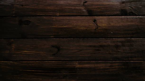 istock black wooden plank desk table background texture top view 1031593660