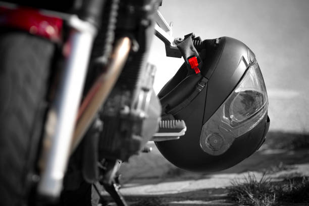.Motorcycle helmet attached to the parked motorcycle