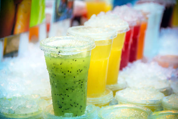 Fruit smoothies on ice Freshly made fruit smoothies on ice at the street market in Venice blended drink photos stock pictures, royalty-free photos & images
