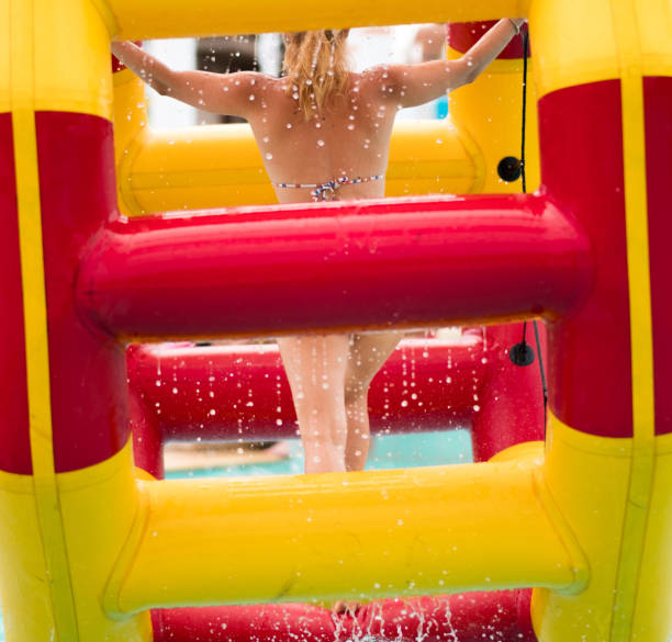 istock Rear view young women at the giant float 1031603284