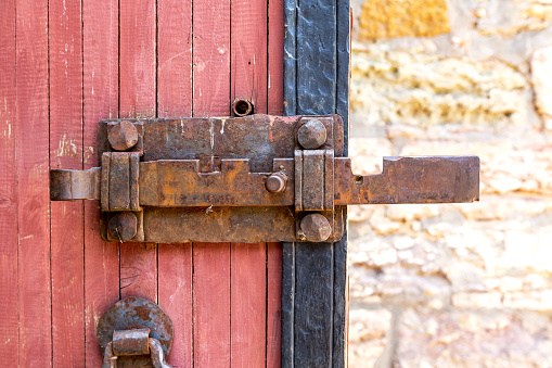 Antique rusty forged massive metal door lock