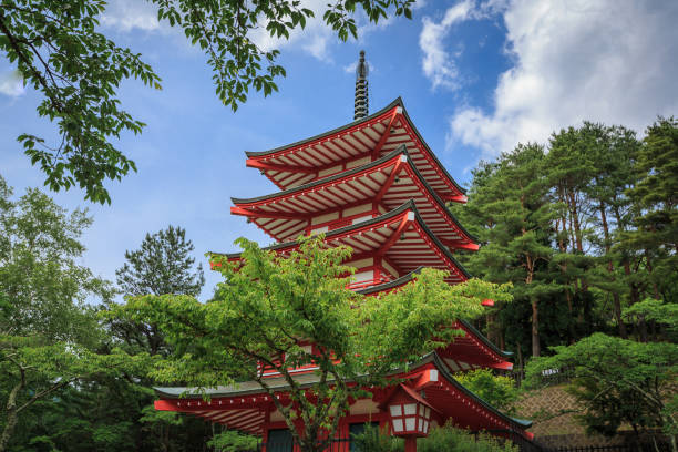 Fujiyoshida, Japan - June 08, 2018: The Chureito Pagoda, a five-storied pagoda also known as the Fujiyoshida Cenotaph Monument, on the top of viewpoint can see mt. Fuji on the background.