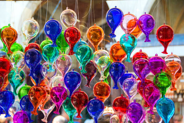 Murano glass balloons Multicolored glass baloons made in Murano, Venetian island. Murano is home to a vast number of factories and a few individual artists' studios making all manner of glass objects from mass marketed stemware to original sculpture. murano stock pictures, royalty-free photos & images