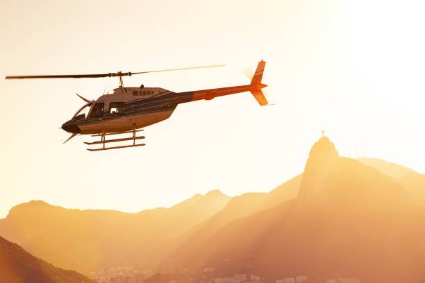 istock helicopter flying over Rio de Janeiro at the evening light 1031613608