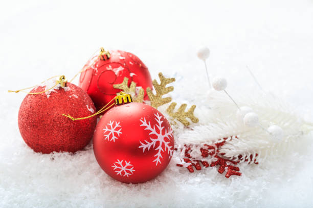 istock Christmas balls and snow on white background 1031620024