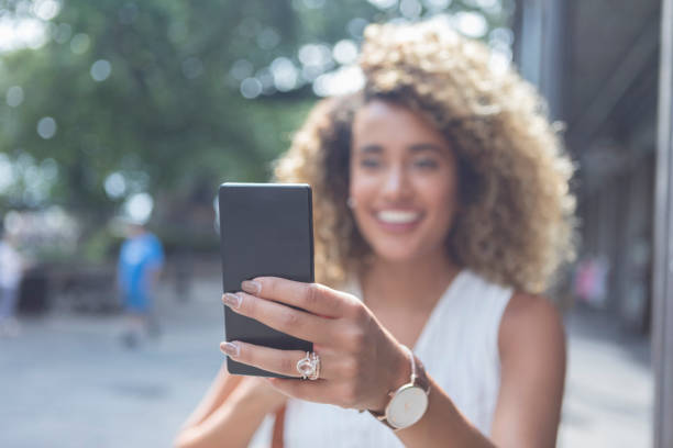 istock Woman takes selfie while on vacation 1031623236