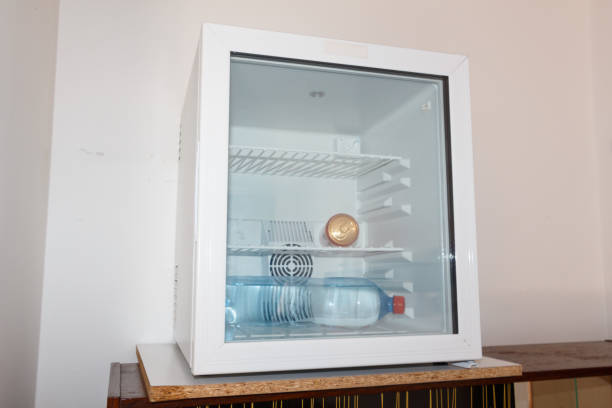 istock Can and water bottle in a mini-fridge 1031623722