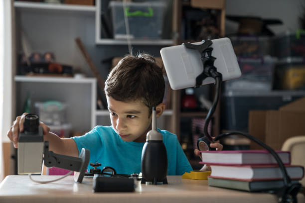 istock Little Boy Learning DIY For Repairing 1031635486