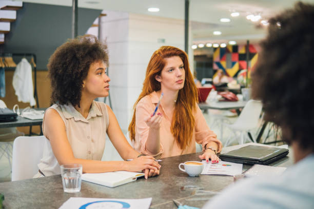 istock Smiling young business women 1031639082