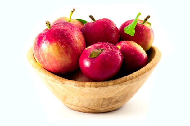 istock Red apples in a wooden bowl 1031645902