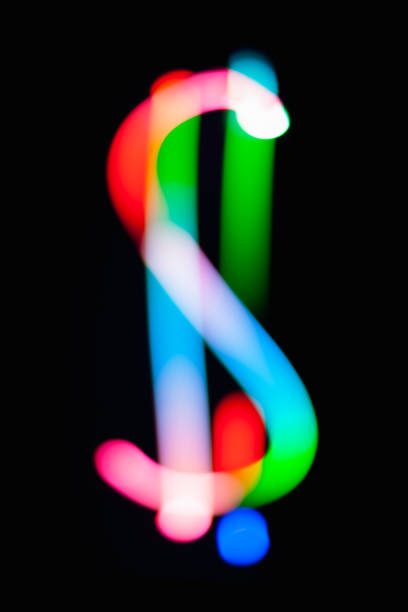 $. Dollar currency. Glowing symbol on dark background. Abstract night light painting. Creative artistic colorful bokeh. New Year. Use  to build you own design for book cover, CD poster or post card $. Dollar currency. Glowing symbol on dark background. Abstract night light painting. Creative artistic colorful bokeh. New Year. Use  to build you own design for book cover, CD poster or post card long shutter speed stock pictures, royalty-free photos & images