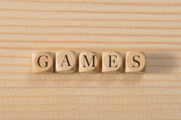 istock Games word on wooden cubes. Games concept 1031672628