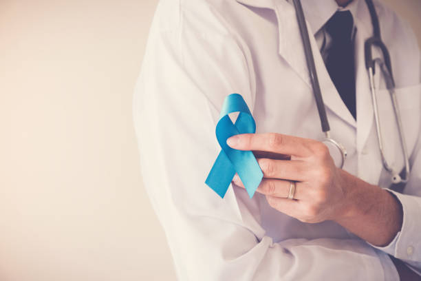 istock Doctor hands holding Light blue ribbon,  Prostate Cancer Awareness 1031703014