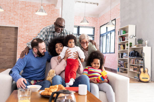 istock Multi-ethnic family portrait at home 1031705742