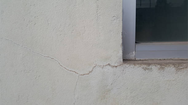 istock Crack on the old cement wall , old cement background texture 1031709808