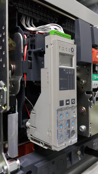 istock electrical part and accessories in the  control cabinet , Main circuit breaker and protection relay for electric low voltage 1031714174