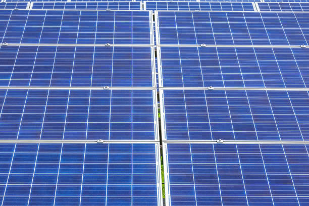 istock rows array of polycrystalline silicon solar cells or photovoltaics in solar power plant turn up skyward absorb the sunlight from the sun 1031722348