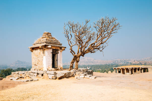 istock Hemakuta Hill Temple, ancient ruins in Hampi, India 1031722548