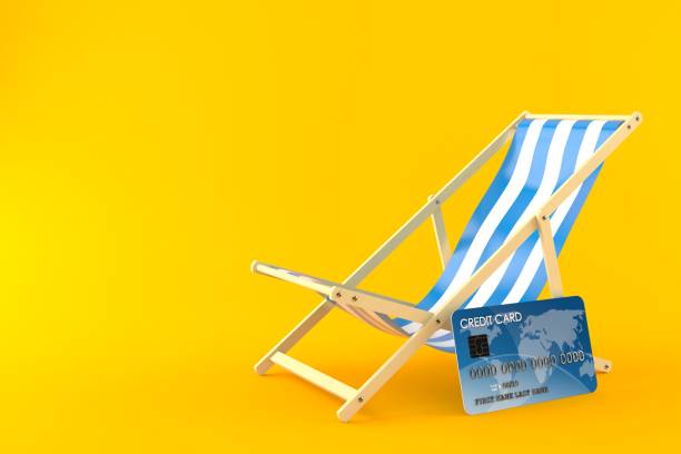 istock Deck chair with credit card 1031731188