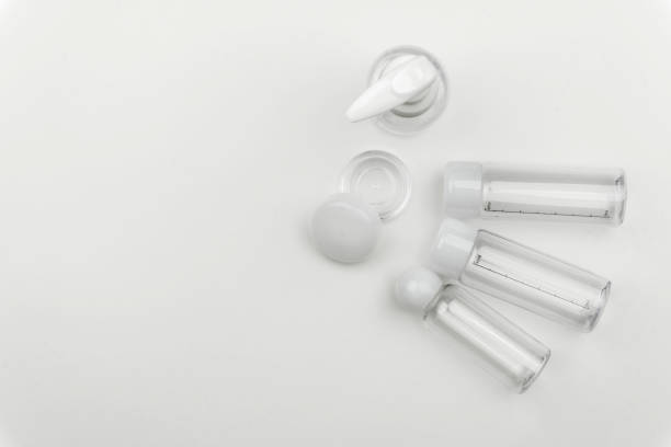 istock top view of the empty clear plastic portable cream jar and liquid containers 1031734694