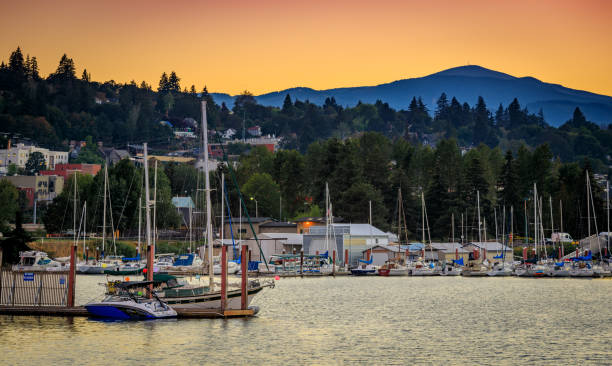 Boats dock at the Port of Hood River Marina on the Columbia River Hood River, Oregon - Sep 2, 2018 : Boats dock at the Port of Hood River Marina on the Columbia River, Oregon state at sunset mclean county stock pictures, royalty-free photos & images