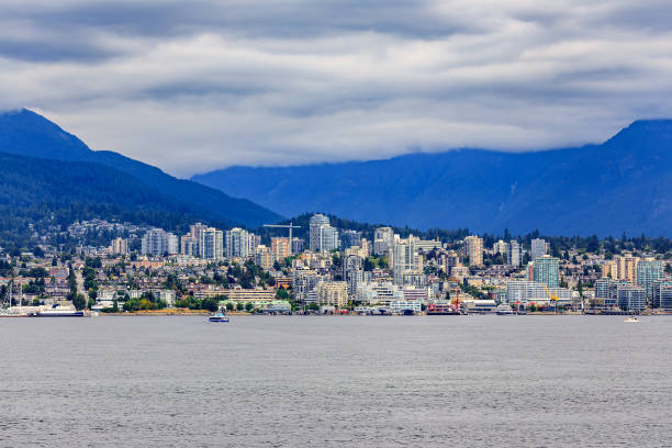 istock Vancouver North Shore skyline and waterfront with Grouse mountain in British Columbia Canada 1031760108