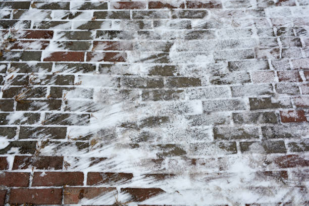 istock Paving slabs with snow in winter 1031762844
