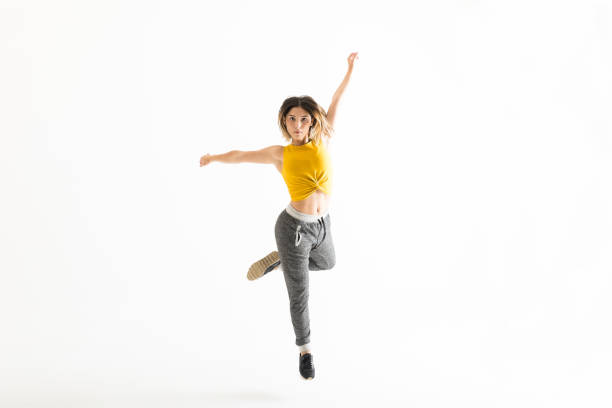 istock Fit Young Woman Dancing Over White Background 1031762914