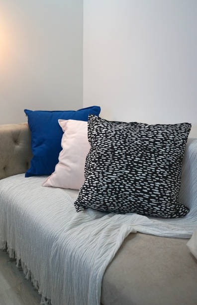 istock Black dot and pale pink and blue pattern cushion 1031767888