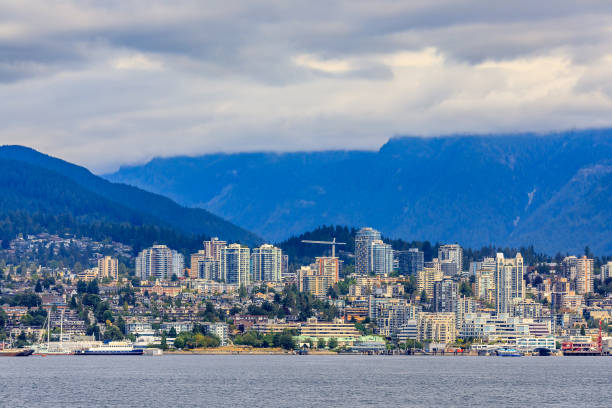 istock Vancouver North Shore skyline and waterfront with Grouse mountain in British Columbia Canada 1031768232