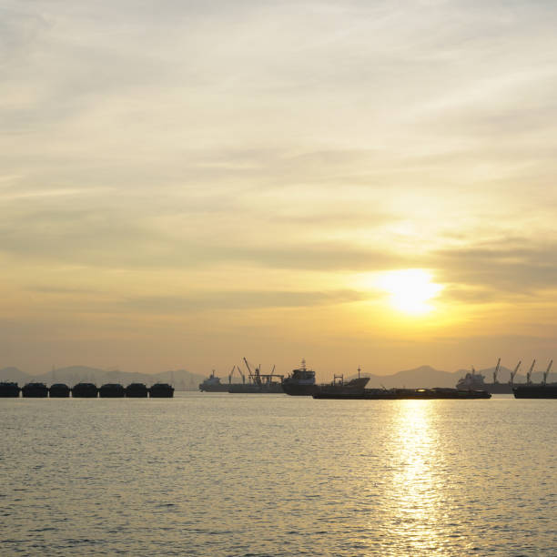 istock Cargo ship parked in the sea. 1031789214