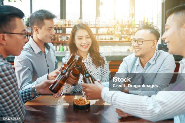Colleagues Drinking Beer Stock Photo - Download Image Now - Alcohol - Drink, Drink, Drinking