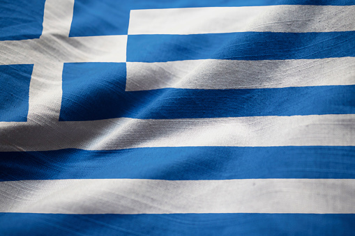 Closeup of Ruffled Greece Flag, Greece Flag Blowing in Wind