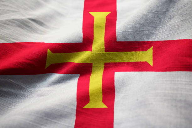 istock Closeup of Ruffled Guernsey Flag 1031798546