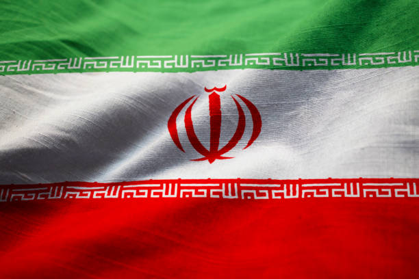 closeup de la bandera de irán con volantes - iranian flag fotografías e imágenes de stock