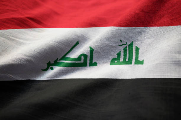 Closeup of Ruffled Iraq Flag Closeup of Ruffled Iraq Flag, Iraq Flag Blowing in Wind iraqi flag stock pictures, royalty-free photos & images