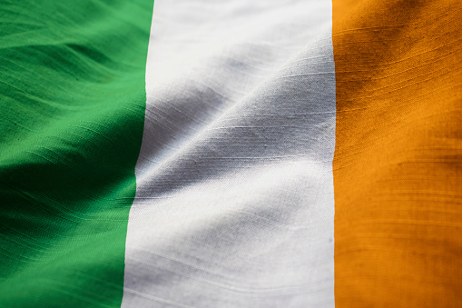 Closeup of Ruffled Ireland Flag, Ireland Flag Blowing in Wind