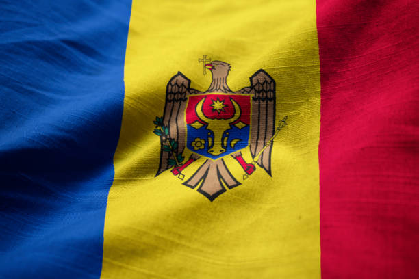 istock Closeup of Ruffled Moldova Flag 1031799924