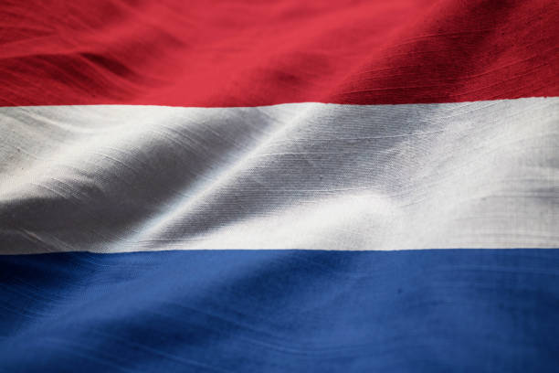 istock Closeup of Ruffled Netherlands Flag 1031802044