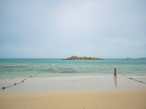 istock Tropical Idyllic ocean Blue sky and beautiful Beach in vacation time 1031802064
