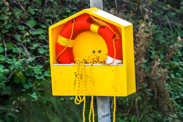 view on orange lifebelt for securing life in ireland - life jacket isolated red safety imagens e fotografias de stock