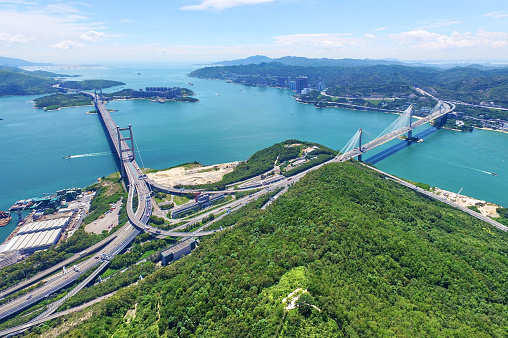 Aerial view of Tsing Ma Bridge at sunny day.