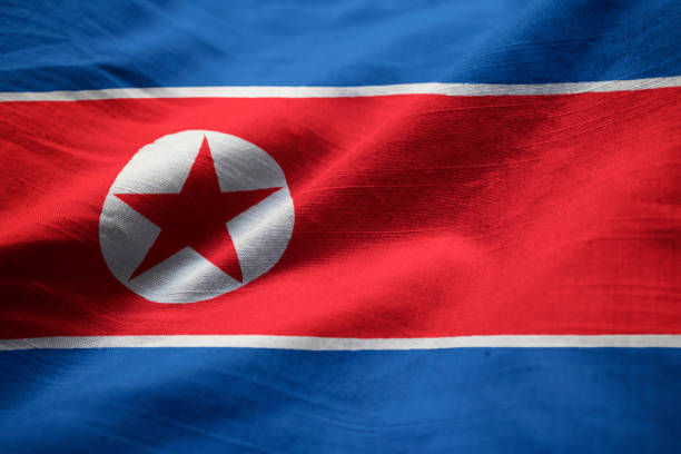 istock Closeup of Ruffled North Korea Flag 1031814458