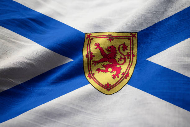 istock Closeup of Ruffled Nova Scotia Flag 1031814528