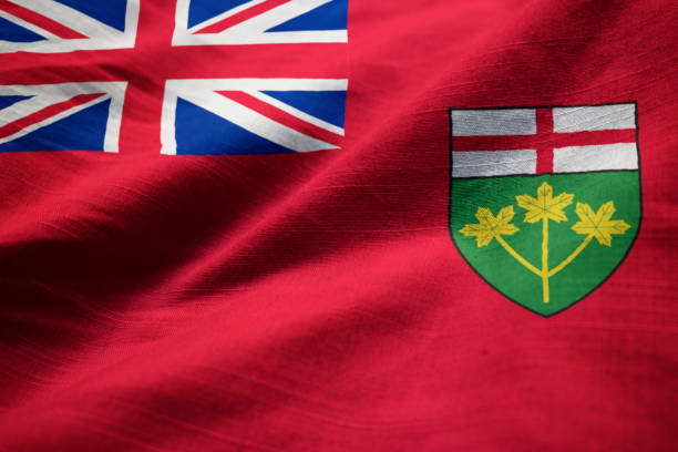 istock Closeup of Ruffled Ontario Flag 1031816622