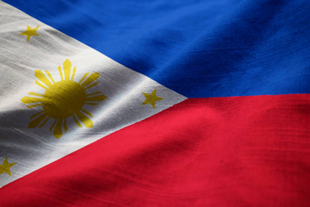 Closeup of Ruffled Philippines Flag Closeup of Ruffled Philippines Flag, Philippines Flag Blowing in Wind philippines photos stock pictures, royalty-free photos & images