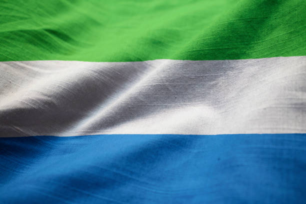 istock Closeup of Ruffled Sierra Leone Flag 1031819604