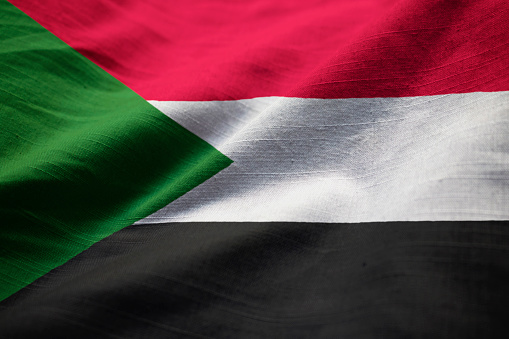 Closeup of Ruffled Sudan Flag, Sudan Flag Blowing in Wind
