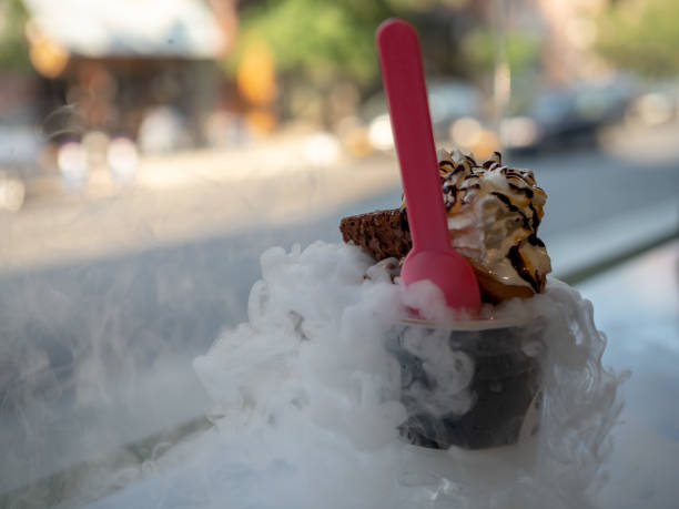 istock Liquid nitrogen brownie and chocolate ice cream cup with fumes 1031822016