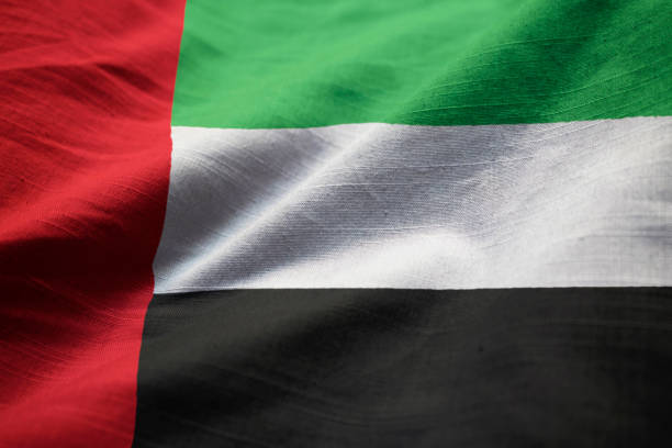 Closeup of Ruffled United Arab Emirates Flag Closeup of Ruffled United Arab Emirates Flag, United Arab Emirates Flag Blowing in Wind united arab emirates flag map stock pictures, royalty-free photos & images